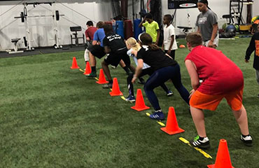 Introductory Youth Speed and Agility Group Classes for boys and girls to help prepare them for any sports or athletic event at Kansas City Athlete Training in Kansas City Missouri